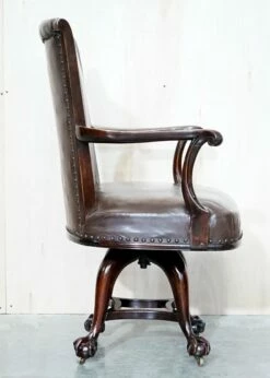 Antique Brown Leather Swivel Captains Chair With Claw & Ball Feet From Thomas Chippendale -PAMONO Sales antique brown leather swivel captains chair with claw ball feet from thomas chippendale 11